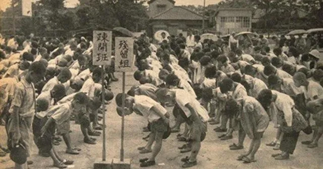 Groups of Japanese children bowing to each other - Land Of The Rising Son